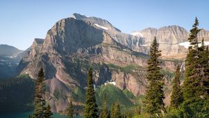 Preview wallpaper mountains, rocks, lake, spruce, sky