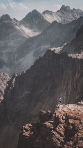 Preview wallpaper mountains, rocks, man, loneliness, nature