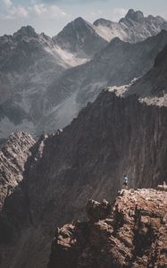 Preview wallpaper mountains, rocks, man, loneliness, nature