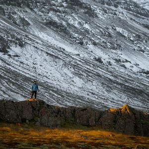 Preview wallpaper mountains, rocks, man, nature, loneliness