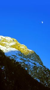 Preview wallpaper mountains, rocks, moon, trees, snowy