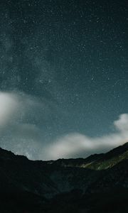 Preview wallpaper mountains, rocks, night, starry sky, stars, clouds