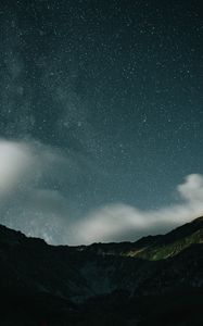 Preview wallpaper mountains, rocks, night, starry sky, stars, clouds