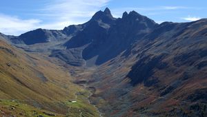 Preview wallpaper mountains, rocks, peak, river, slope