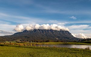 Preview wallpaper mountains, rocks, peaks, lake, grass