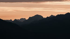 Preview wallpaper mountains, rocks, peaks, sunset, silhouette