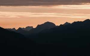 Preview wallpaper mountains, rocks, peaks, sunset, silhouette