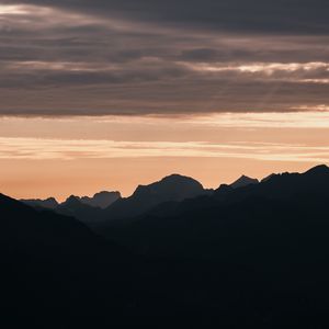 Preview wallpaper mountains, rocks, peaks, sunset, silhouette