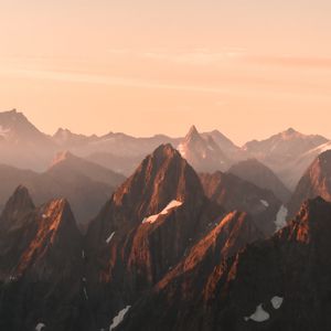 Preview wallpaper mountains, rocks, peaks, sunset, distance