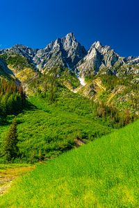 Preview wallpaper mountains, rocks, relief, grass, slopes, landscape