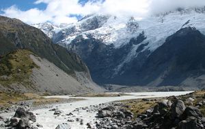 Preview wallpaper mountains, rocks, river, water, stones, snow, tops