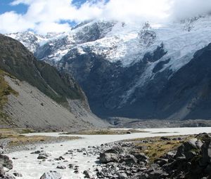 Preview wallpaper mountains, rocks, river, water, stones, snow, tops