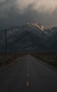 Preview wallpaper mountains, rocks, road, marking, dark