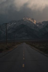 Preview wallpaper mountains, rocks, road, marking, dark