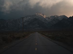 Preview wallpaper mountains, rocks, road, marking, dark