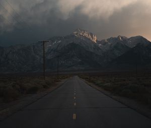 Preview wallpaper mountains, rocks, road, marking, dark