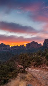 Preview wallpaper mountains, rocks, road, trees, sunset, landscape