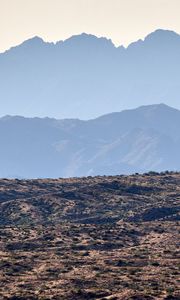 Preview wallpaper mountains, rocks, sand, grass, distance