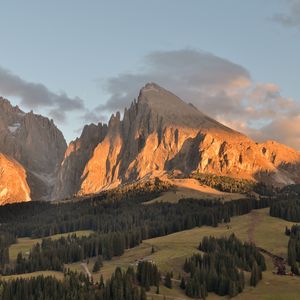 Preview wallpaper mountains, rocks, shadows, trees, valley