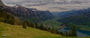 Preview wallpaper mountains, rocks, slope, grass, sky, clouds