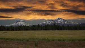 Preview wallpaper mountains, rocks, snow, sky, clouds, forest, field