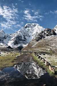 Preview wallpaper mountains, rocks, snow, snowy, lake, reflection