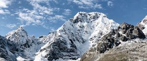 Preview wallpaper mountains, rocks, snow, snowy, lake, reflection