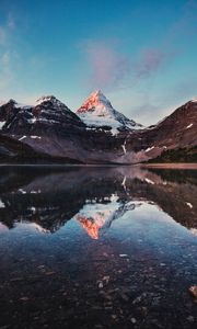 Preview wallpaper mountains, rocks, snow, snowy, lake, reflection, sky