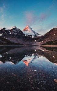 Preview wallpaper mountains, rocks, snow, snowy, lake, reflection, sky