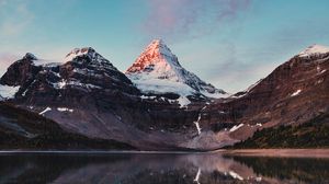 Preview wallpaper mountains, rocks, snow, snowy, lake, reflection, sky