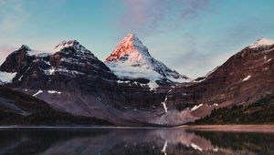 Preview wallpaper mountains, rocks, snow, snowy, lake, reflection, sky