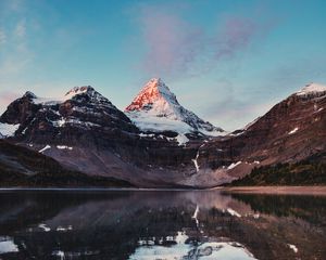 Preview wallpaper mountains, rocks, snow, snowy, lake, reflection, sky