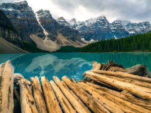 Preview wallpaper mountains, rocks, snow, snowy, logs