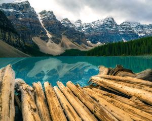 Preview wallpaper mountains, rocks, snow, snowy, logs