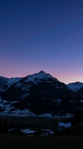 Preview wallpaper mountains, rocks, snow, snowy, sky, sunset