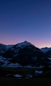 Preview wallpaper mountains, rocks, snow, snowy, sky, sunset