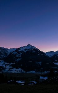 Preview wallpaper mountains, rocks, snow, snowy, sky, sunset