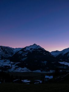 Preview wallpaper mountains, rocks, snow, snowy, sky, sunset