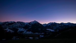 Preview wallpaper mountains, rocks, snow, snowy, sky, sunset