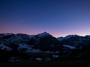 Preview wallpaper mountains, rocks, snow, snowy, sky, sunset