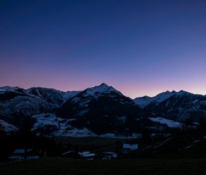 Preview wallpaper mountains, rocks, snow, snowy, sky, sunset