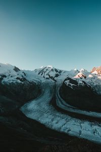Preview wallpaper mountains, rocks, snow, snowy, relief, sky