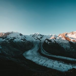 Preview wallpaper mountains, rocks, snow, snowy, relief, sky