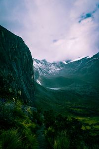 Preview wallpaper mountains, rocks, snow, snowy, grass, clouds