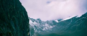 Preview wallpaper mountains, rocks, snow, snowy, grass, clouds