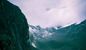 Preview wallpaper mountains, rocks, snow, snowy, grass, clouds