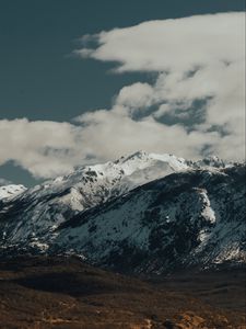 Preview wallpaper mountains, rocks, snow, snowy, peaks, sky