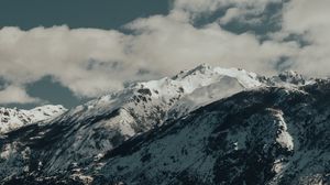 Preview wallpaper mountains, rocks, snow, snowy, peaks, sky