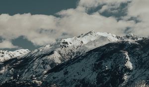 Preview wallpaper mountains, rocks, snow, snowy, peaks, sky