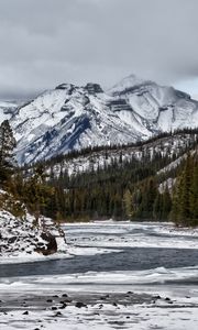 Preview wallpaper mountains, rocks, snow, lake, snowy, trees